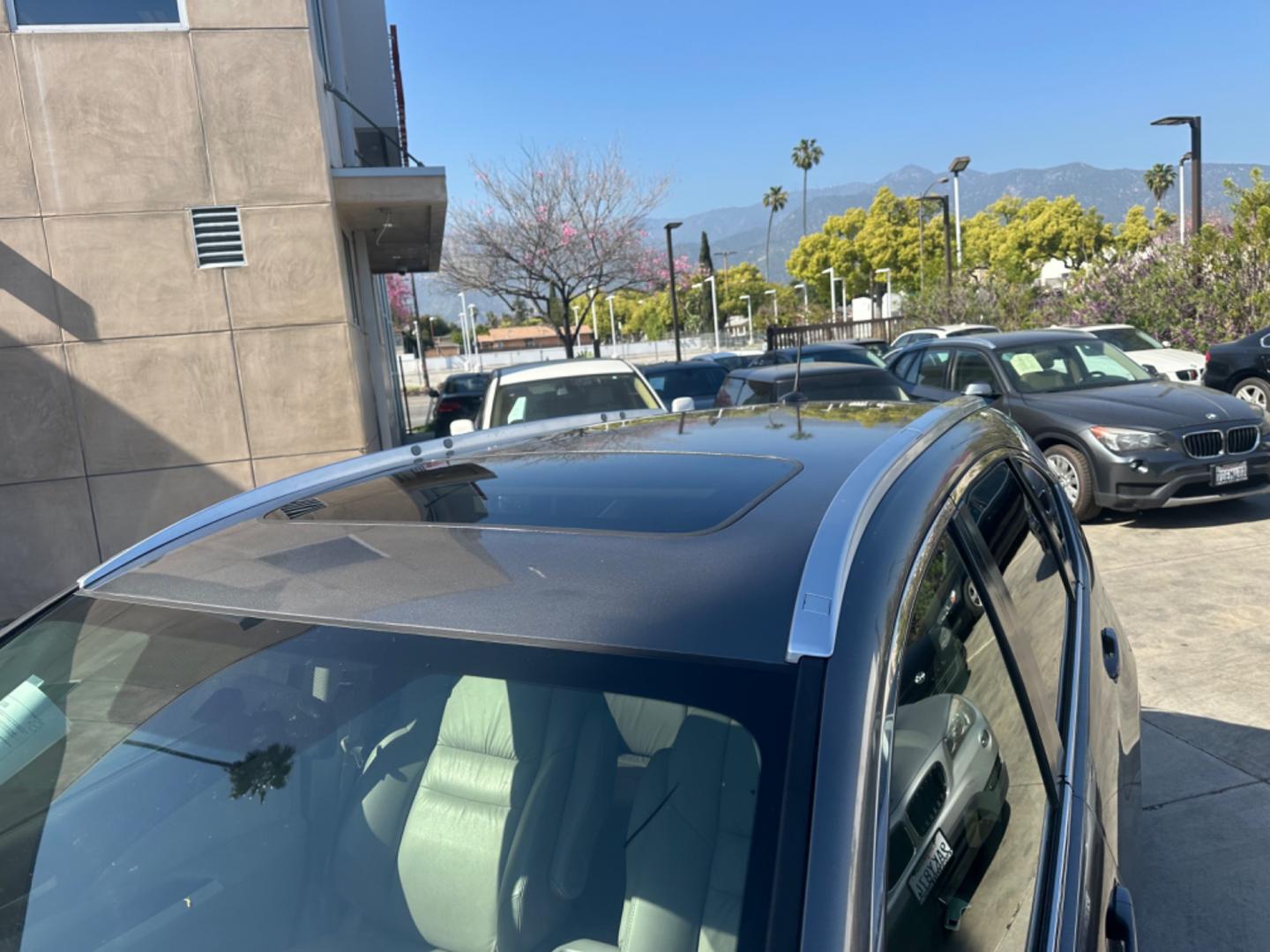 2012 BLUE /GRAY Honda CR-V leather (JHLRM3H70CC) with an 4 CYLINDER engine, Automatic transmission, located at 30 S. Berkeley Avenue, Pasadena, CA, 91107, (626) 248-7567, 34.145447, -118.109398 - Cars and Trucks!! Leather! Moon-roof! Well equipped! In the bustling streets of Pasadena, CA, and the vibrant neighborhoods of Altadena, Glendale, and the broader LA County, finding a reliable, stylish, and affordable vehicle can be a daunting task, especially if you're navigating the complexities - Photo#9